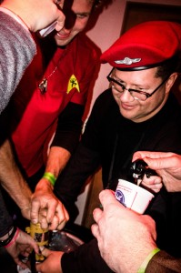 Red Shirt Volunteers Gather Around Their Complimentary Keg (Courtesy of Franzia Ellers)