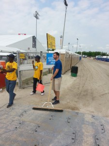 Fellow Volunteer Pushing a Broom That First Saturday